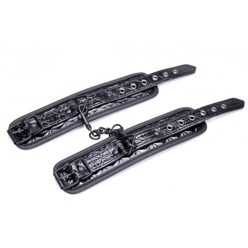 Дизайнерские поножи черного цвета