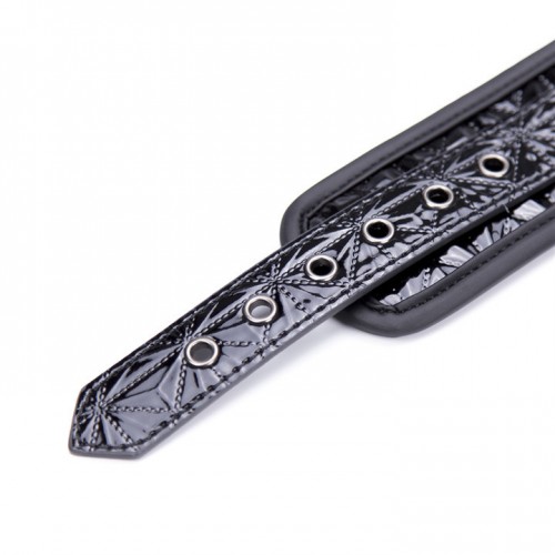 Дизайнерские поножи черного цвета