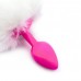 Розовая анальная пробка с белым хвостом