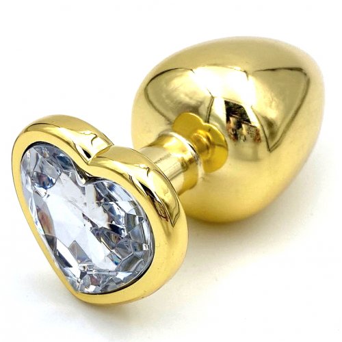 Золотая металлическая анальная пробка с прозрачным камушком в виде сердечка L Золотая металлическая анальная пробка с прозрачным камушком в виде сердечка L